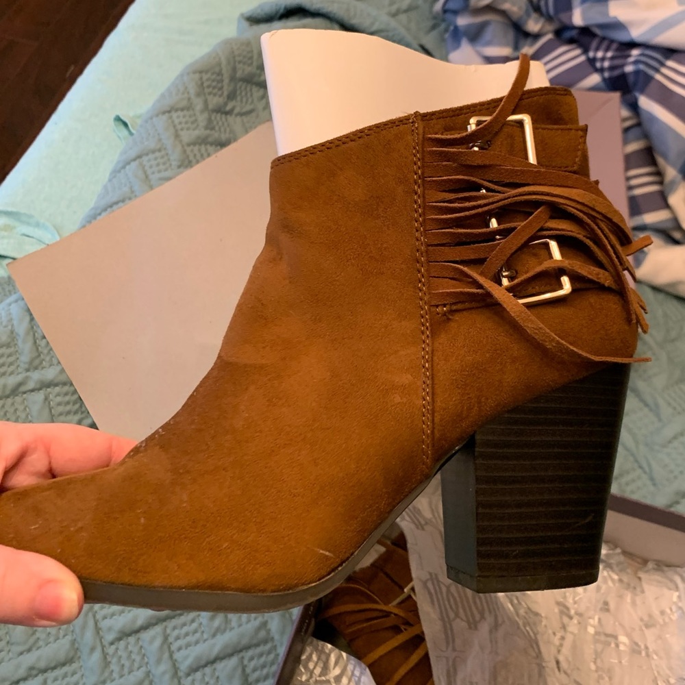 Jennifer Lopez boots with fringe